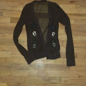 Shear button up top with beautiful flower detailin